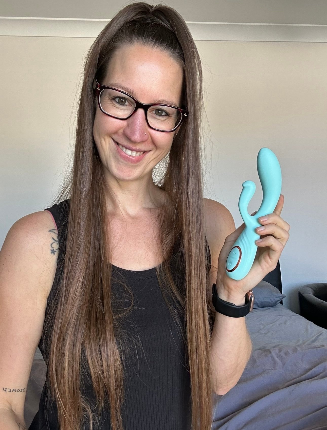 Pleasure Toy Queen Patricia holding he Kali Vibe Athena vibrator