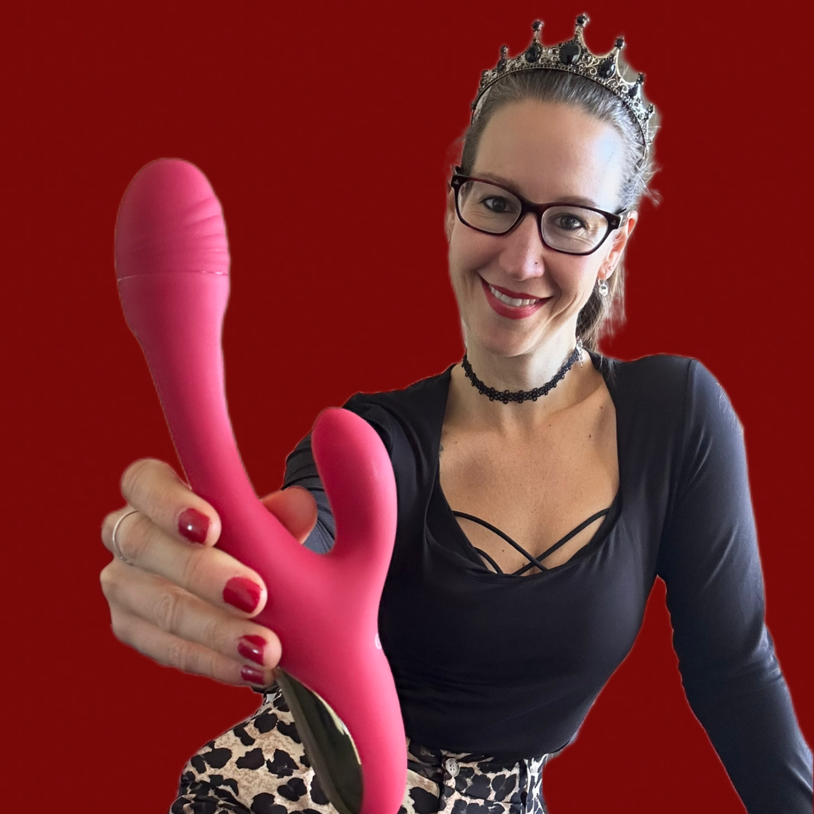 Pleasure Toy Queen Patricia holding the sweet smile rabbit vibrator