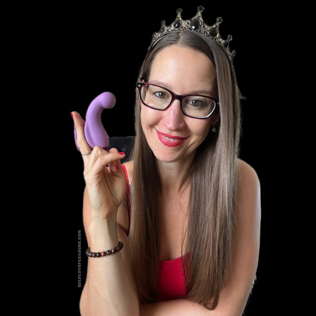 Pleasure Toy Queen holding the JimmyJane vibrator