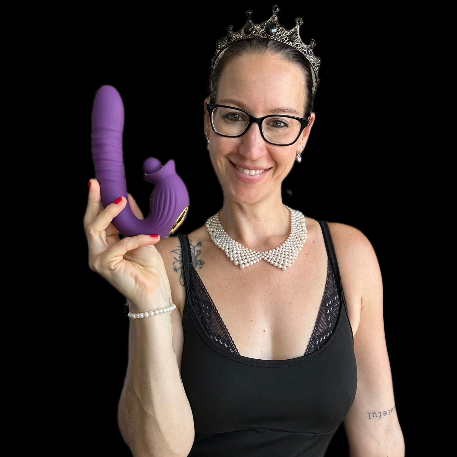 Pleasure Toy Queen Patricia holding the Ciro dual stimulation pleasure toy