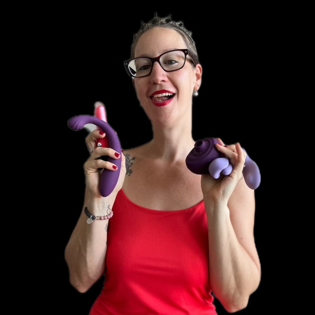 Pleasure Toy Queen Patricia holding her 3 favourite pleasure toys from Tracy's Dog
