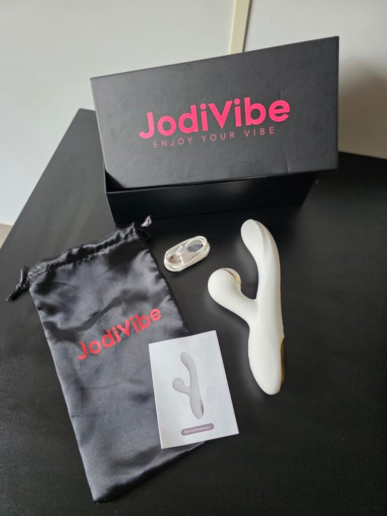 JodiVibe Diana vibrator, storage bag, charging cable and instruction manual