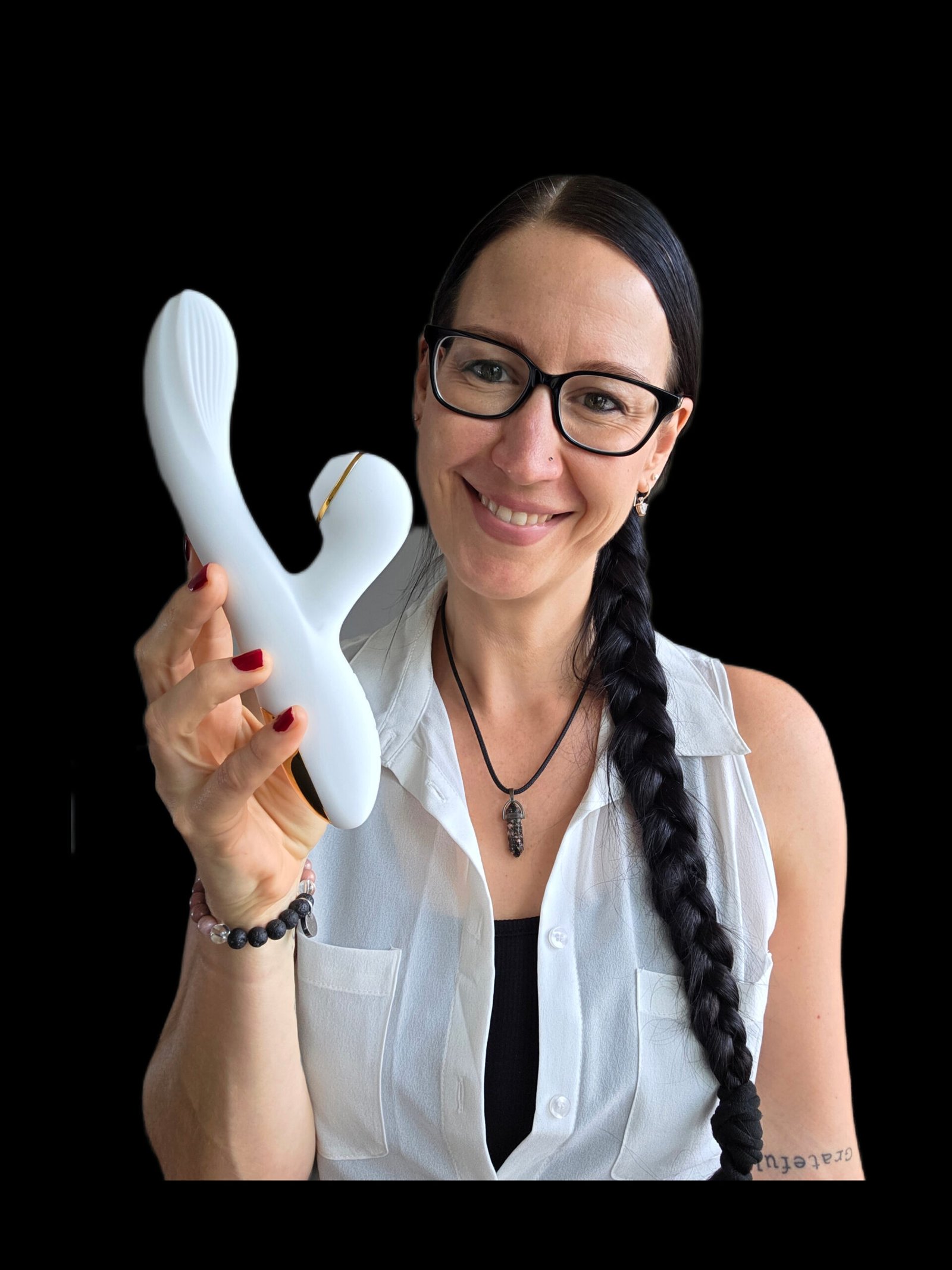 Pleasure Toy Queen Patricia holding the white JodiVibe Diana